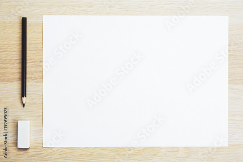 Desktop with white paper