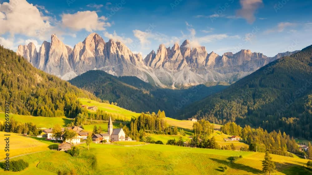 Sunny day in St. Magdalena village. Location famous place Funes valley, Dolomiti Alps. Time lapse clip.
