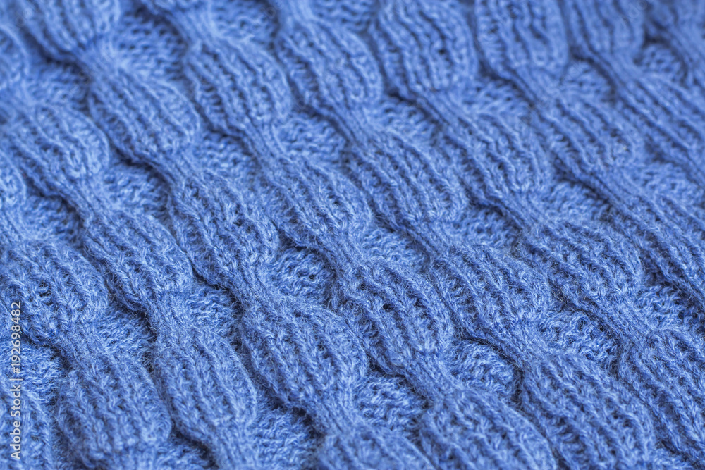 Blue Knitted Fabric Texture. Beautiful knitting wool background. Blue Knitted Fabric Texture. Beautiful knitting wool background.