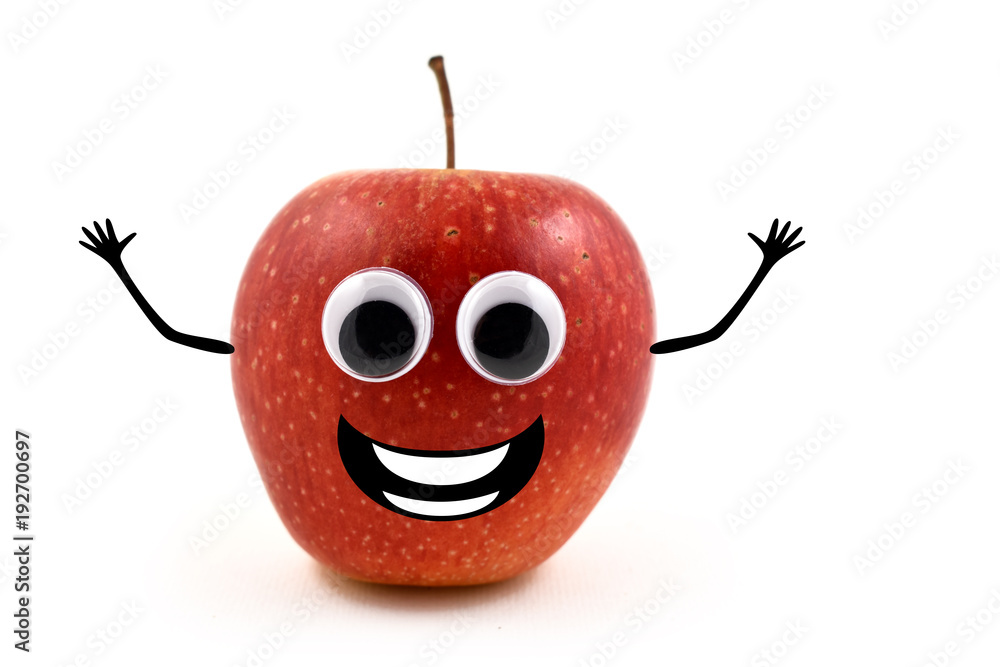 Funny cheerful apple with googly eyes stock images. Happy red apple on