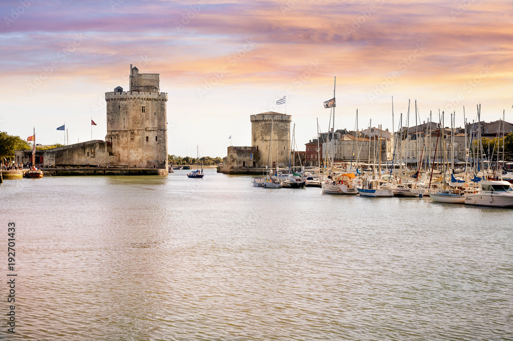 La Rochelle. Walled entry port of La Rochelle in France,tower of the Chaine (tour de la Chaine) on the left, tower saint Nicolas (Tour saint nicolas) on the right. Region Charente Poitou. France.