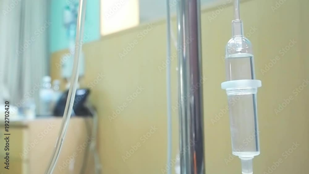 Infusion pump or Saline solution intravenous (IV) drip for patient and infusion pump in hospital Infusion pump or Saline solution intravenous (IV) drip for patient and infusion pump in hospital