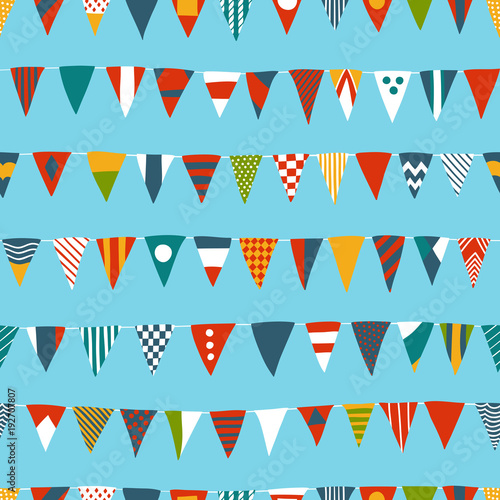 Multicolored Hand-drawn Seamless Pattern with Nautical Signal Flags on a Blue Background