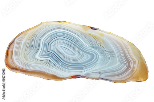 Amazing Banded Agate Crystal cross section cut isolated on white background. Natural light translucent agate crystal surface, Gray abstract structure slice mineral stone macro closeup