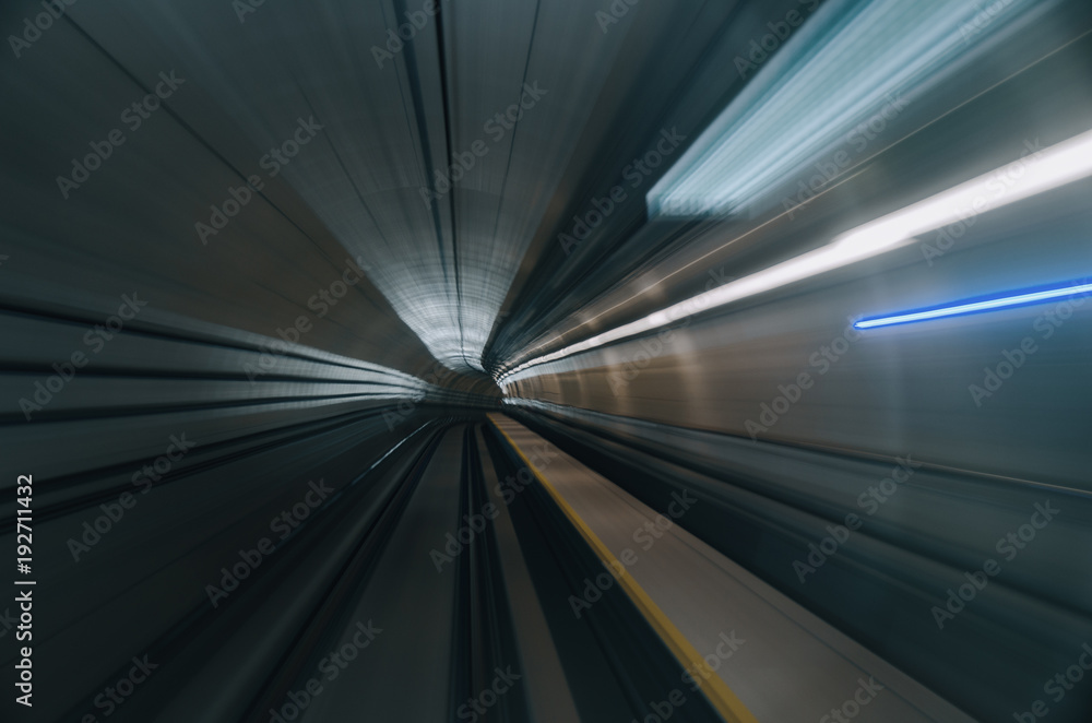 blurred motion effect background under subway tunnel