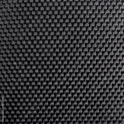 Black plaid fabric background macro