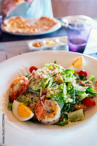 Caesar salad with grilled shrimps