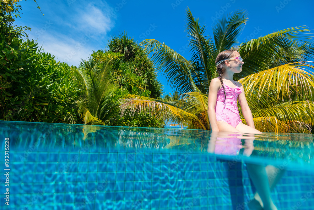 Little girl in swimming pool