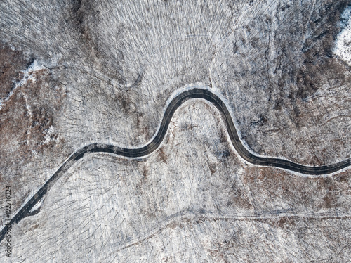 Aerial view of curvy road © Csák István