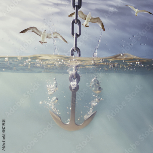 Fotografiet anchor dropping into water