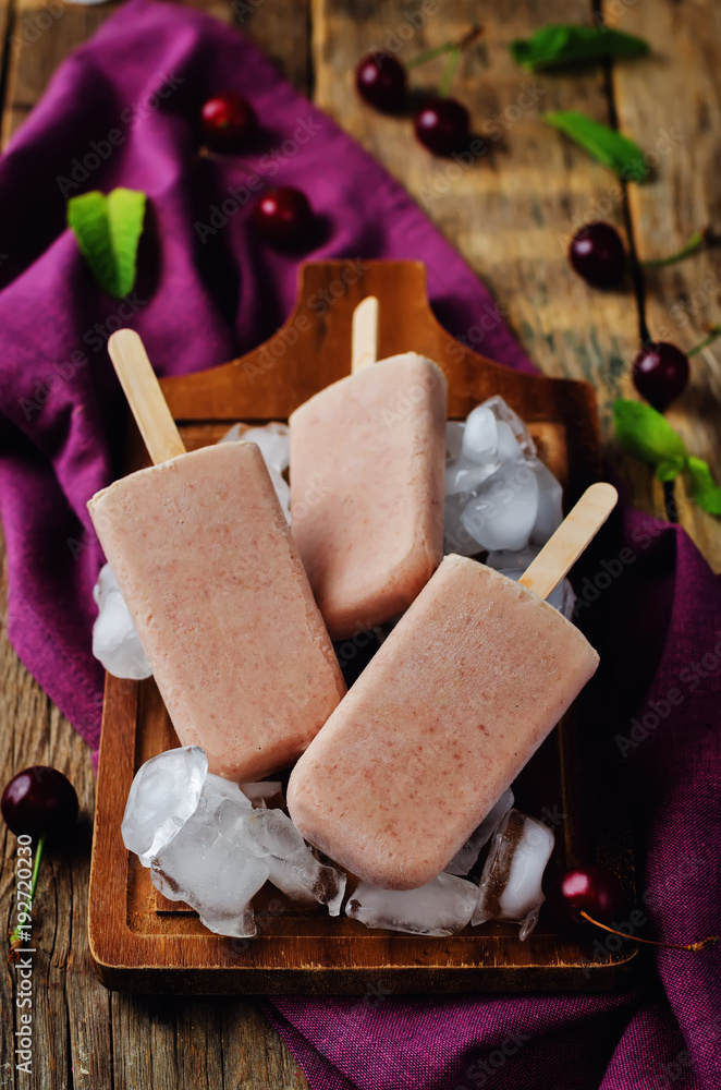Fototapeta premium Cherry ice cream with mint and fresh cherries