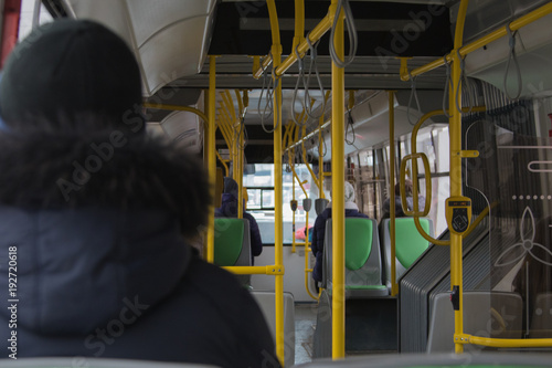 People in public transport in bad weather