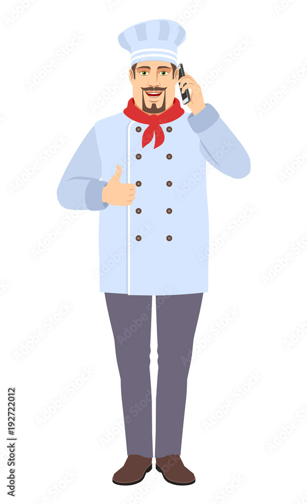 Chef talking on the mobile phone and showing thumb up Chef talking on the mobile phone and showing thumb up