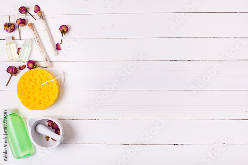 Skin care set on a white wooden background