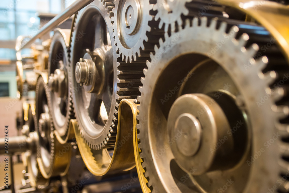 huge mechanical gears wheels at printery closeup view huge mechanical gears wheels at printery closeup view
