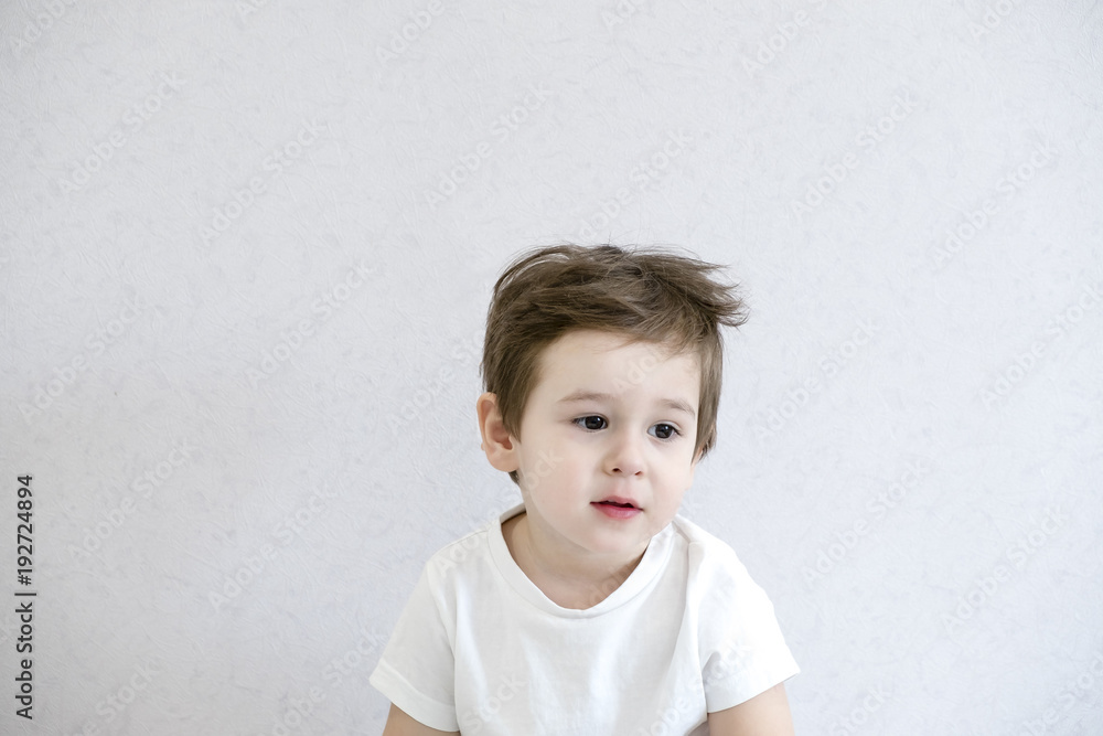 Fototapeta premium Portrait of little boy with upset, Kid sad face, Unhappy child looking out, Spoiled children concept
