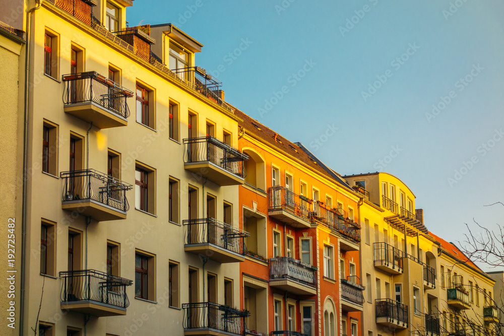 beautiful residential houses in warm sunlight with clean sky