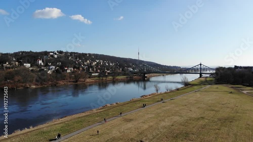 Aerial drone shot of Dresden Loschwitzer Bridge Blaues Wunder early morning with beautiful sunrise scenery Germany photo