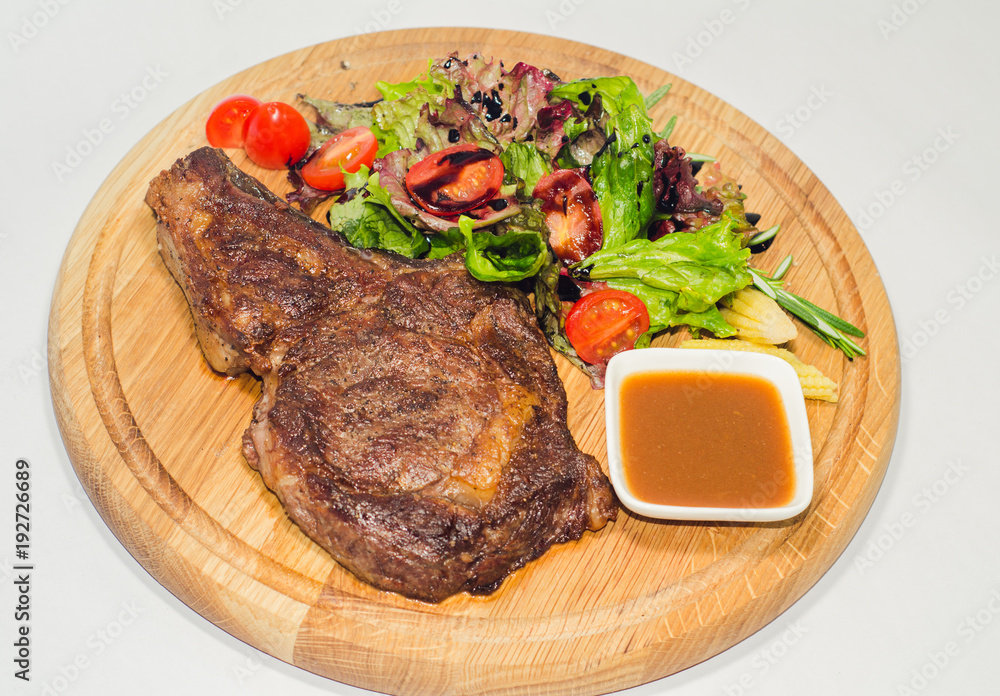 well-fried juicy steak with vegetables 