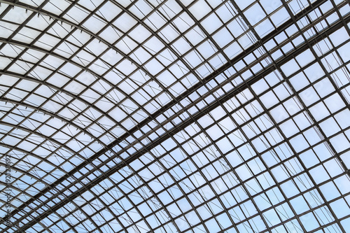 Semicircular glass roof on a metal frame as a background or a backdrop