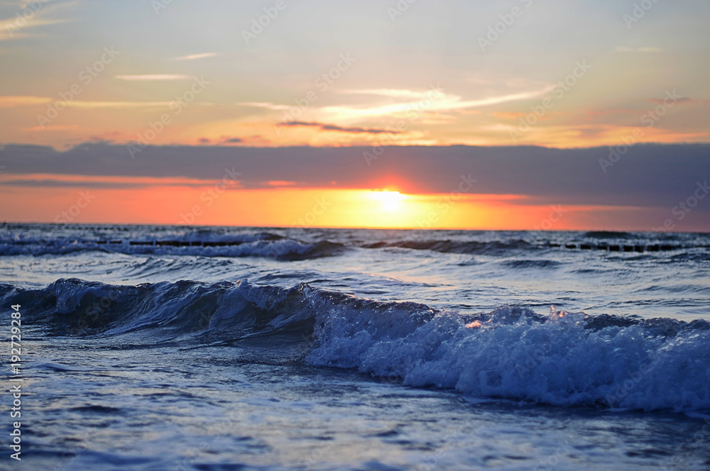 Ocean waves at sunset  