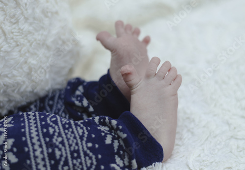 newborn legs wearing in pants photo