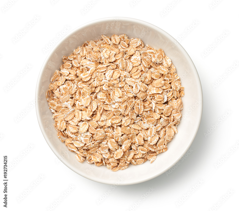 Oat Rye Flakes in Bowl Isolated on White Background Oat Rye Flakes in Bowl Isolated on White Background