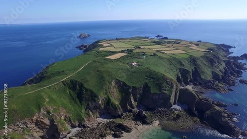 Fly above Sark the crown jewel of the Channel Islands, United Kingdom ( aerial footage ) photo