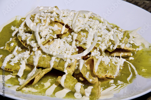 Green Chilaquiles with cheese and sour cream