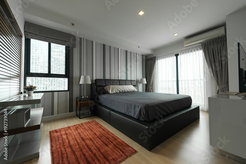 Modern bedroom interior - bed at home bedroom