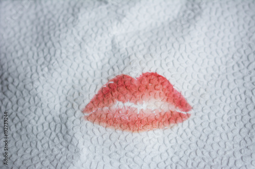 Kiss lipstick from lips on a paper napkin