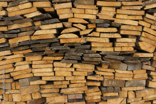 Woodpile. Thin boards stacked on top of each other. 