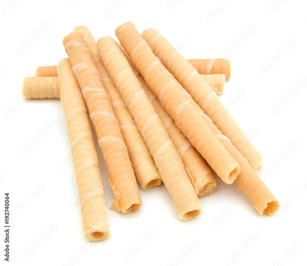 Wafer roll sticks cream rolls over a white background Wafer roll sticks cream rolls over a white background