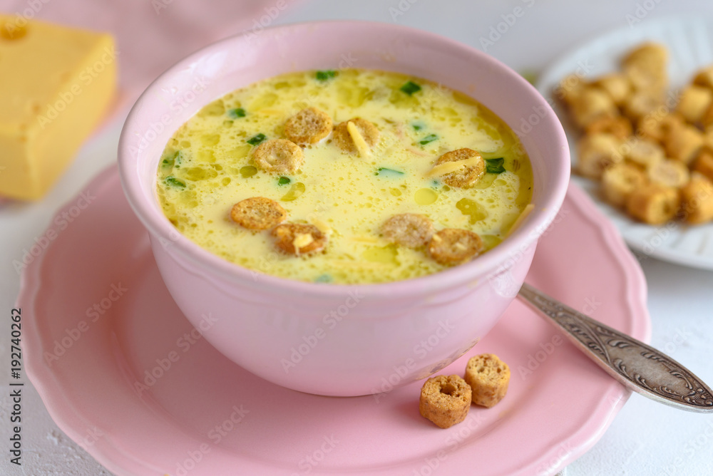 Cheese soup with croutons and fresh herbs. Cheese soup with croutons and fresh herbs.