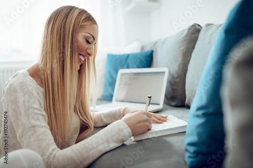 Student Girl Learning At The Home