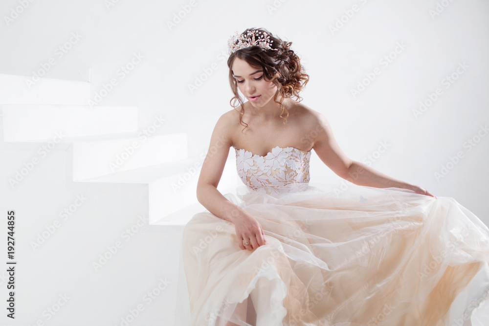 Concept of bride going towards future happiness. Beautiful girl in a wedding dress. Concept of bride going towards future happiness. Beautiful girl in a wedding dress.