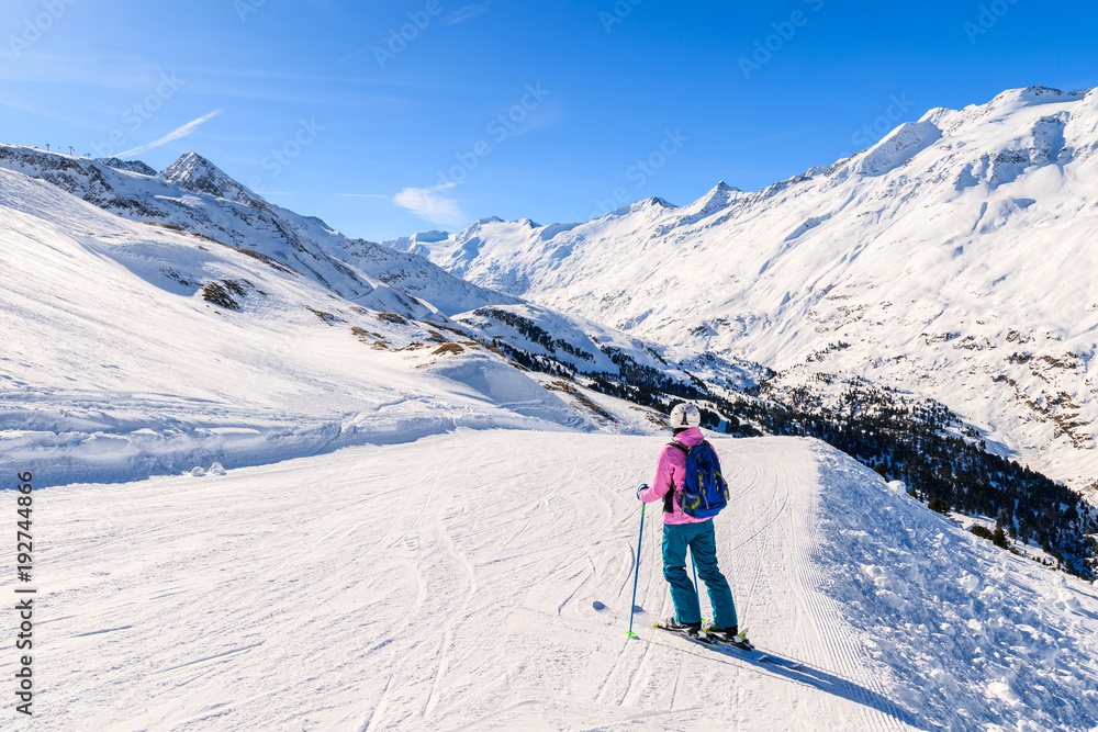 Young woman skier on ski slope in winter season in Hochgurgl-Obergurgl mountain resort, Austria