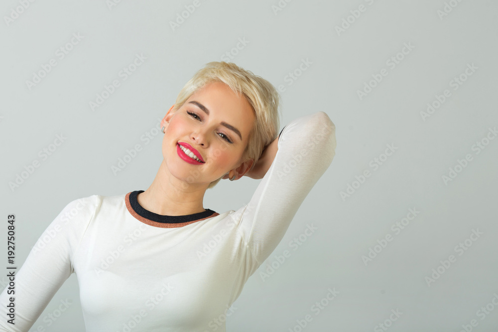 beautiful young girl with short hair style smiling on white background beautiful young girl with short hair style smiling on white background