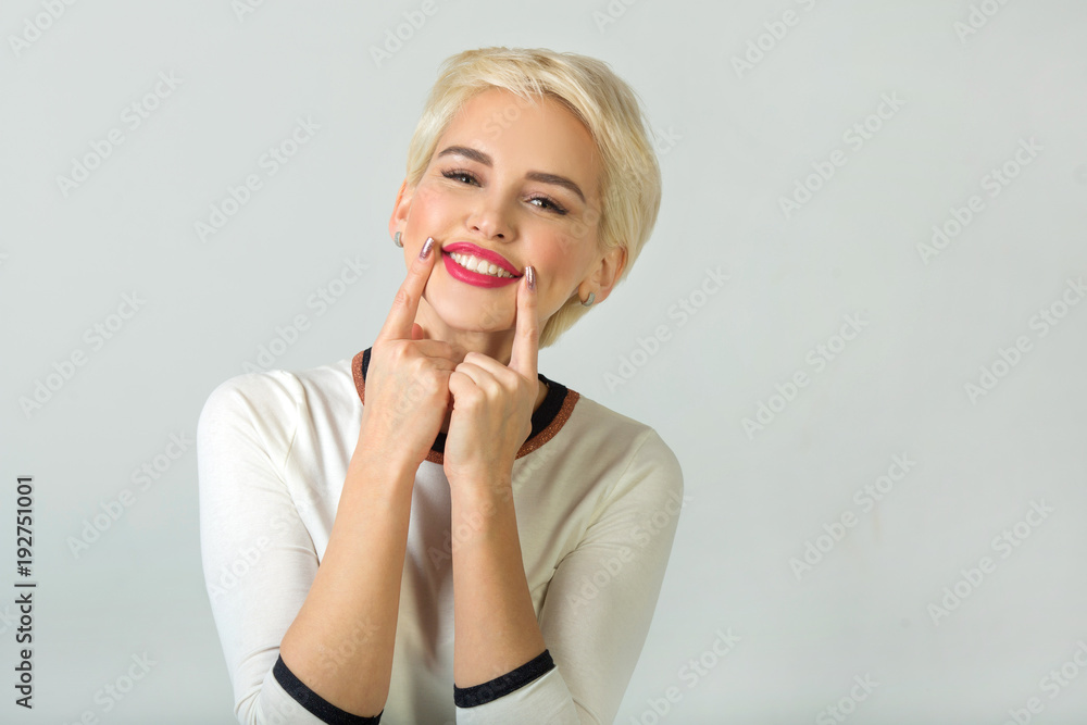 beautiful young girl with short hair style smiling on white background beautiful young girl with short hair style smiling on white background