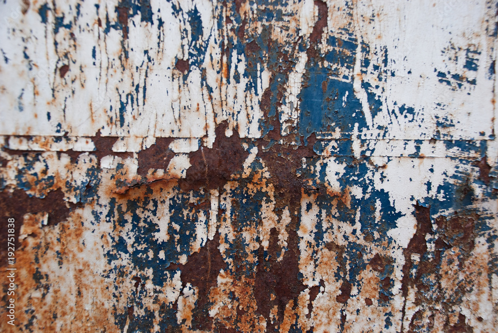 Fototapeta premium Background iron rusty artistic wall peeling paint.Grunge texture.Very graphic and edgy spray on metal abstract .