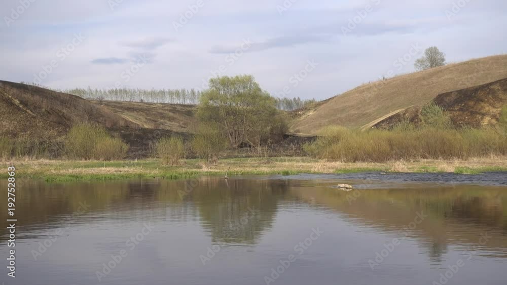 Riffle on river stream at spring, 4K 2160p video clip Riffle on river stream at spring, 4K 2160p video clip