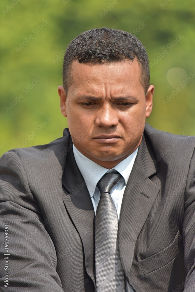 Hispanic Businessman And Depression Wearing Suit And Tie Hispanic Businessman And Depression Wearing Suit And Tie