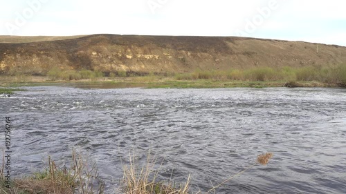 Rapid river stream at spring, 4K ultra hd 2160p video footage photo