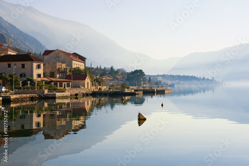 Beautiful Mediterranean landscape on a misty day. Montenegro, winter . View of Bay of Kotor ( Adriatic Sea ) and Dobrota town