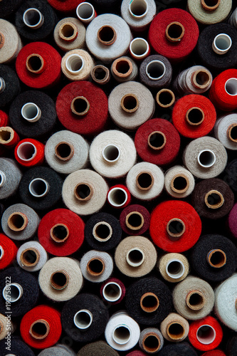 set threads different color sewing needlework different multicolored palette warm red black bright shade gray red white