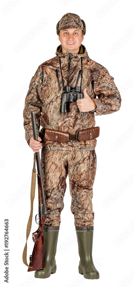 Full length portrait of a male hunter with double barreled shotgun Isolated on white background. hunting and people concept. Full length portrait of a male hunter with double barreled shotgun Isolated on white background. hunting and people concept.