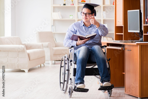 Disabled student studying at home on wheelchair © Elnur
