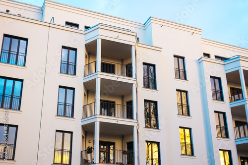 high contrasted modern apartment building with colorful windows