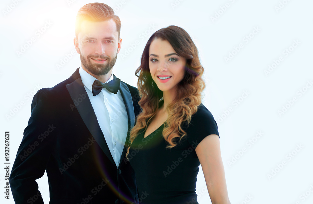 Portrait of a handsome man looking at the camera with a woman Portrait of a handsome man looking at the camera with a woman