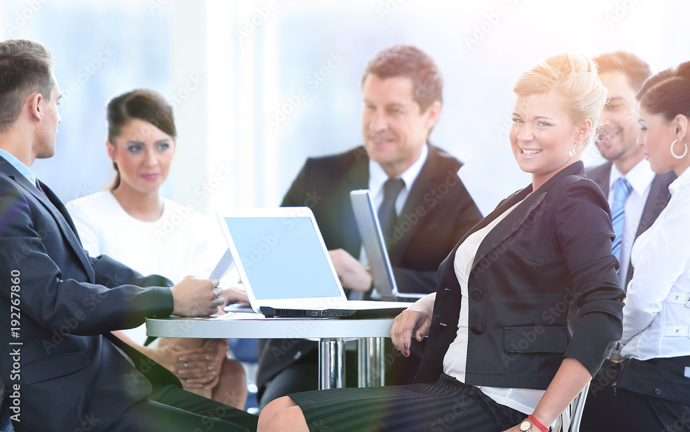 Business Team Discussing Ideas in Lounge Business Team Discussing Ideas in Lounge
